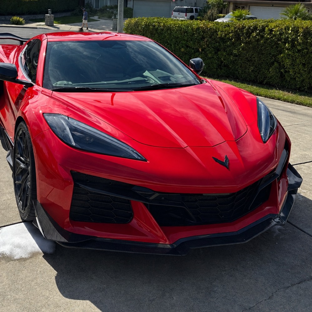 After — the same Corvette washed and polished to a deep gloss
